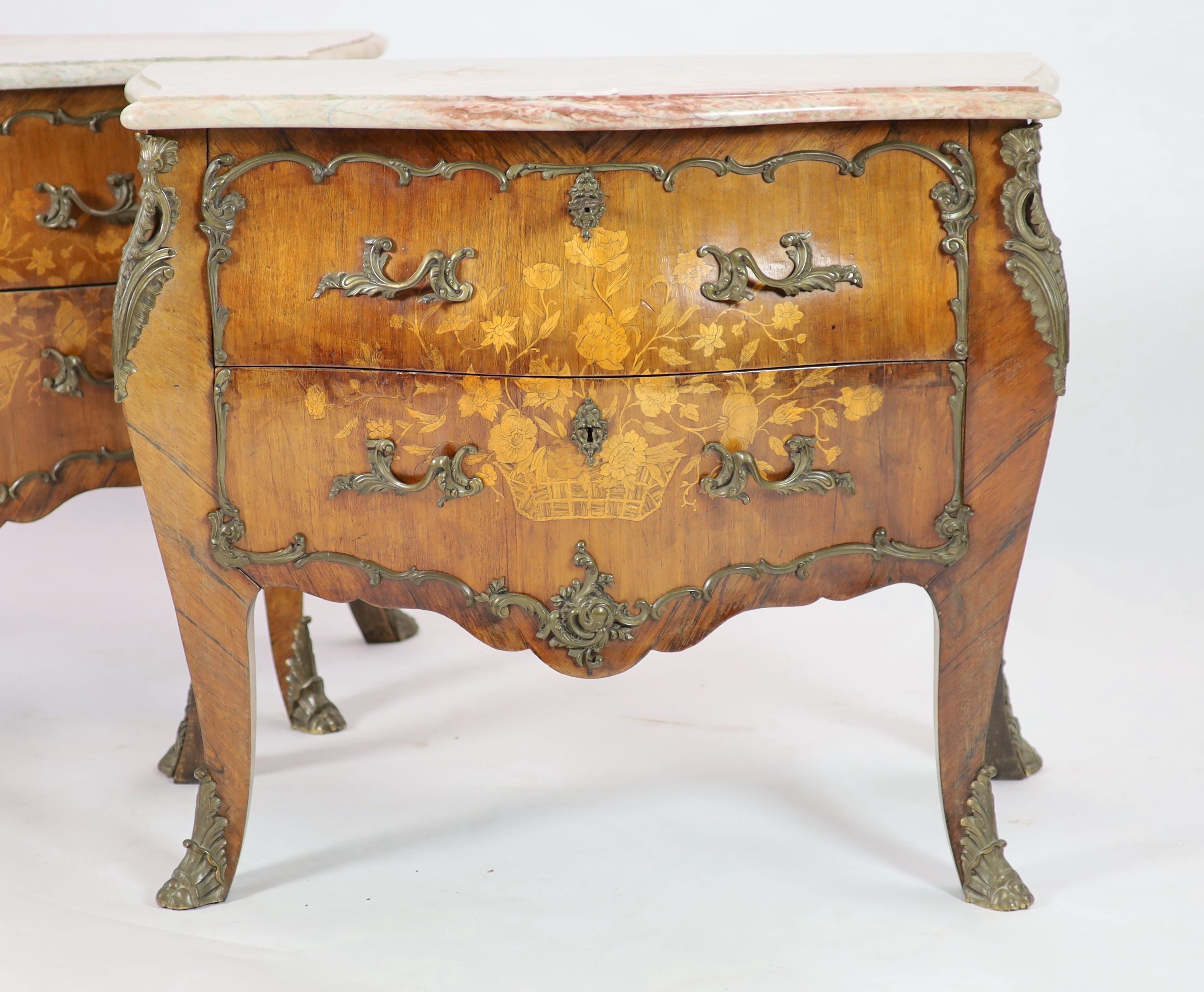 A pair of 18th century style Dutch kingwood and floral marquetry bombe commodes W.102cm D.52cm H.85cm